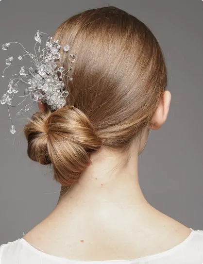 A timeless hairstyle inspired by wedding hairstyles for guests.