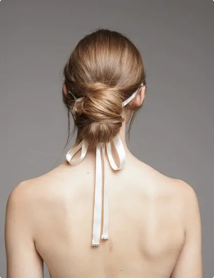 A graceful look completed with wedding hairstyles for guests.